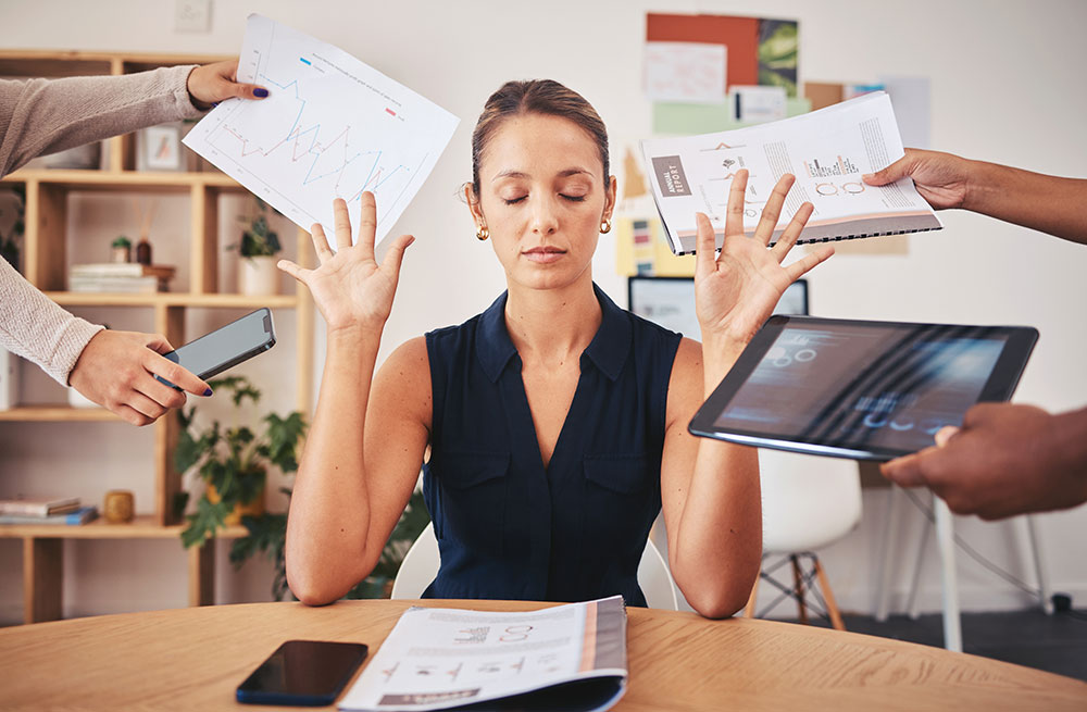 Stressful woman with too much work coming to her